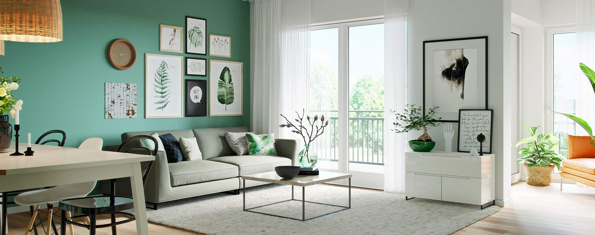 Einladendes Wohnzimmer mit grüner Akzentwand, stilvoller Dekoration und viel Tageslicht.