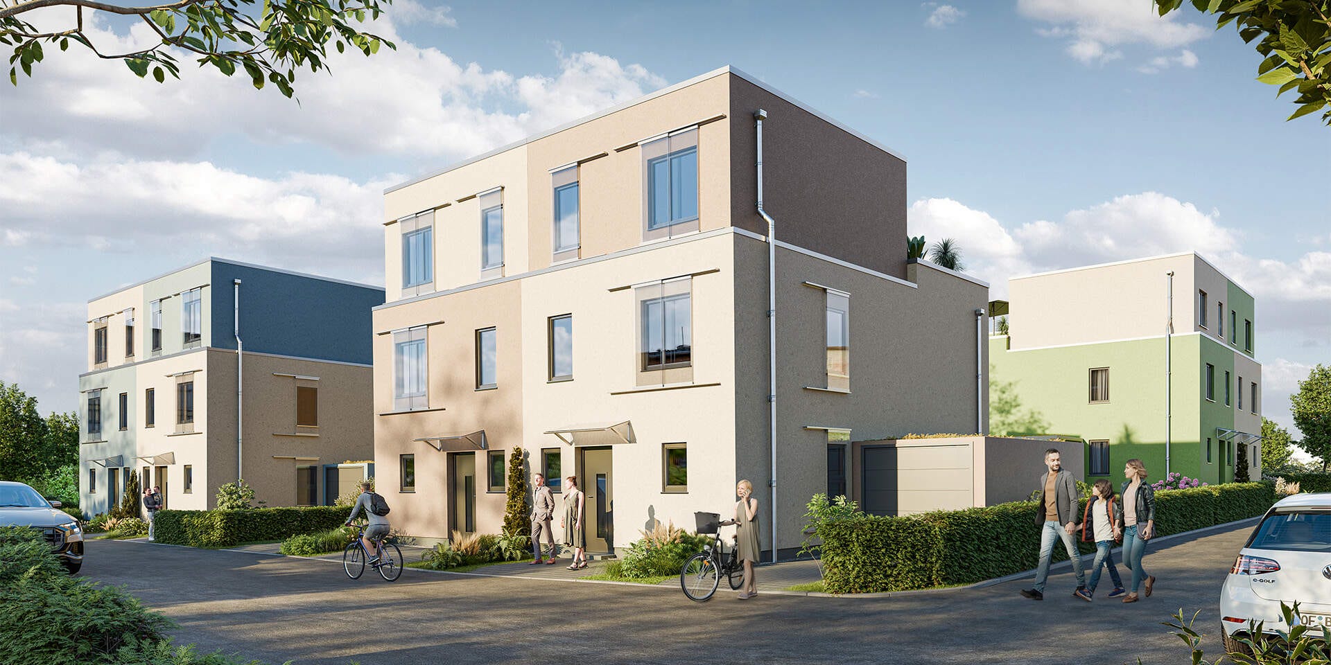 Modernes Neubauprojekt mit Mehrfamilienhäusern, grüner Umgebung und entspannten Bewohnern. Ideal für Familien.