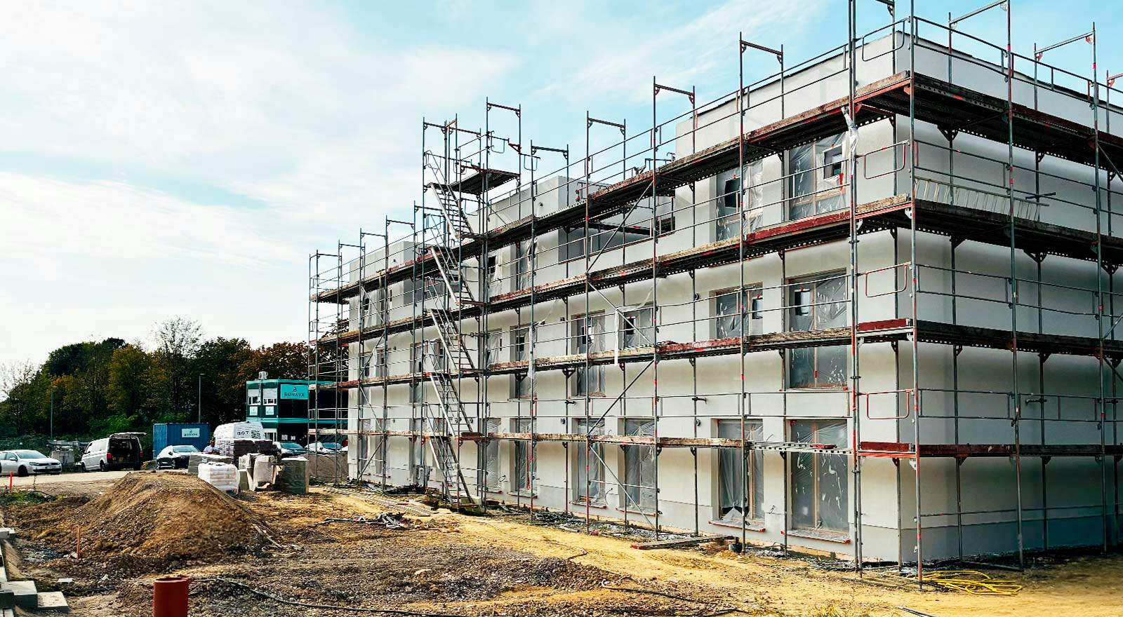 Häuser 31-35 auf dem Weg zur fertigen Fassade